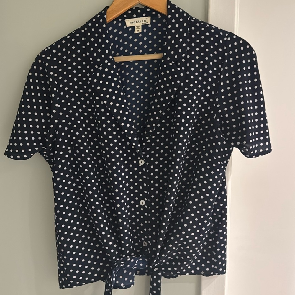 Monteau blue and white polka dot tie front blouse